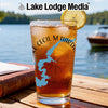 Iced tea in a glass with a blue lake outline and compass design.
