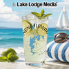 Clear glass with drink, limes, mint, compass, Wisconsin map, and text.