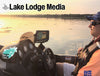 Man in boat at sunset with "Lake Lodge Media" and "Indian Life" logos.