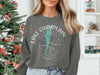 Gray sweatshirt with "Lake Champlain Vermont" text and compass graphic.