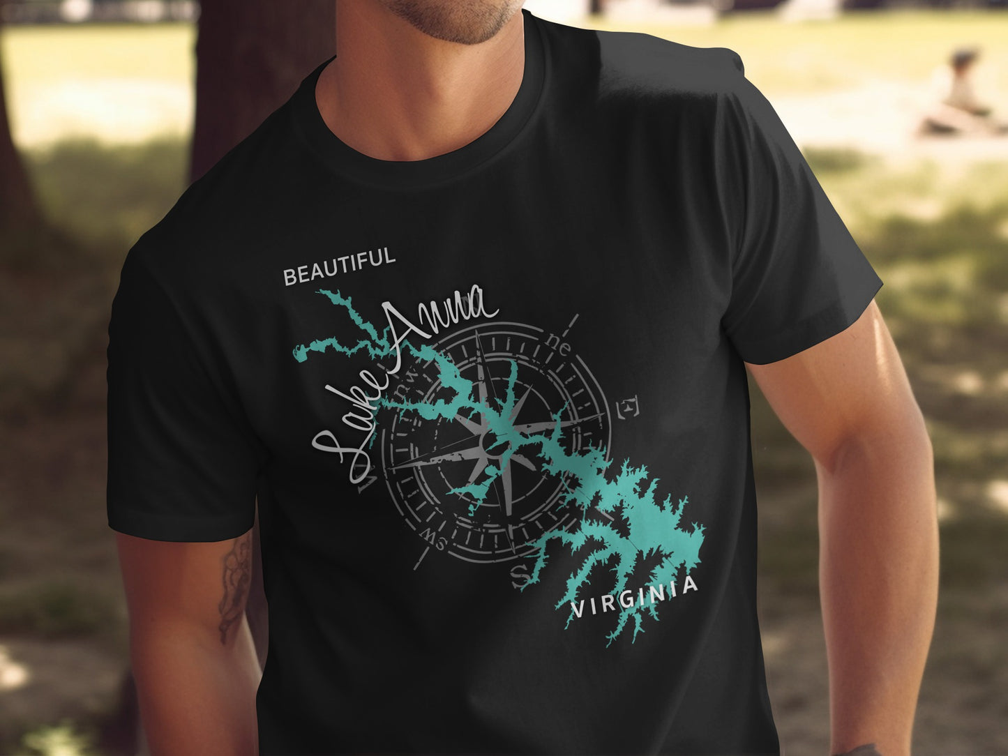 Black t-shirt with a teal compass rose and Lake Anna, Virginia design.