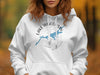 White hoodie with "Lake Wisconsin" text, a map outline, and compass rose graphic.