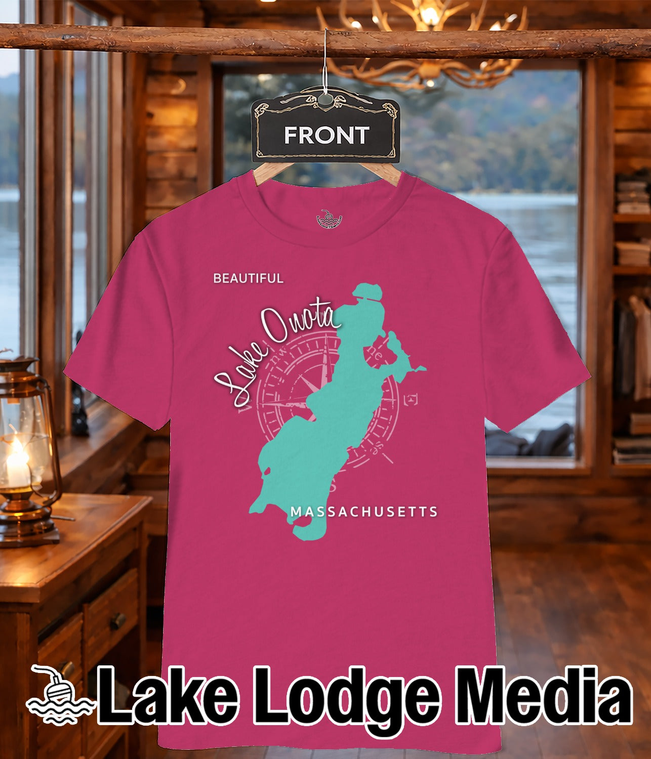 Pink t-shirt with teal "Lake Ouota Massachusetts" compass graphic.
