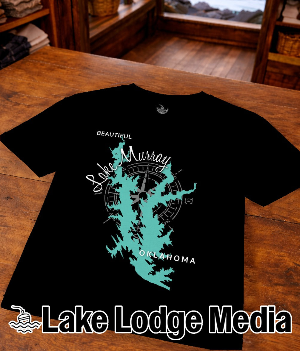 Black t-shirt with a teal map of Lake Murray, Oklahoma, and "Lake Lodge Media" logo.