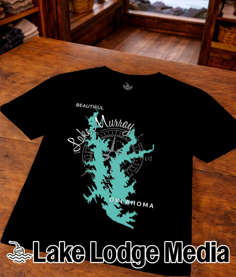 Black t-shirt with a teal map of Lake Murray, Oklahoma, and "Lake Lodge Media" logo.
