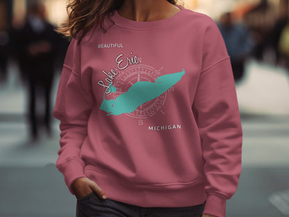 Pink sweatshirt with "Lake Erie Michigan" and compass rose design.
