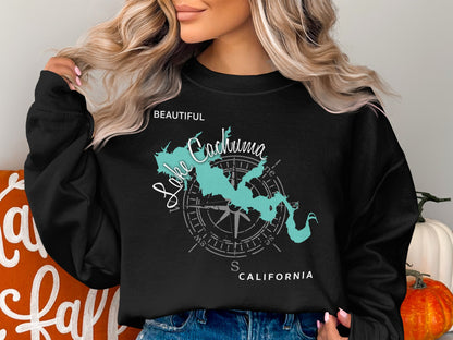 Black sweatshirt with a teal map of Lake Cachuma and compass rose.