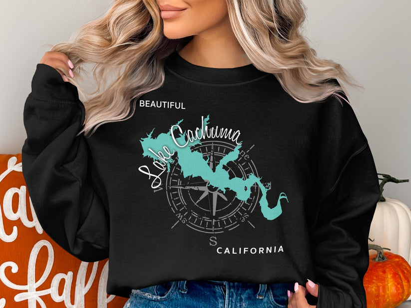 Black sweatshirt with a teal map of Lake Cachuma and compass rose.