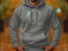 Grey hoodie with "Highland Lakes Texas" text and compass graphic.