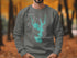 Gray sweatshirt with turquoise Moss Lake map and compass, "Beautiful" and "North Carolina".