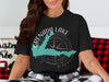 Black t-shirt featuring Grenada Lake Mississippi map and compass design.