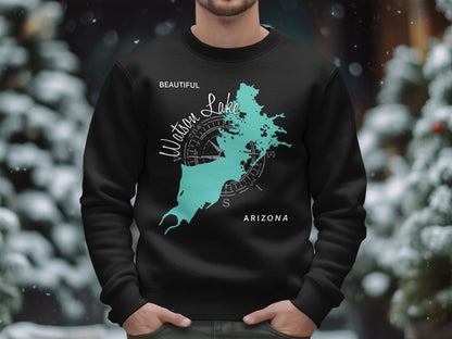 Black sweatshirt with teal Watson Lake map and compass on chest.