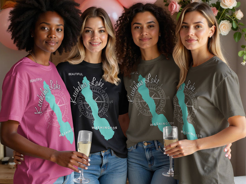 Four women in t-shirts with Keechelus Lake Washington graphic and compass.