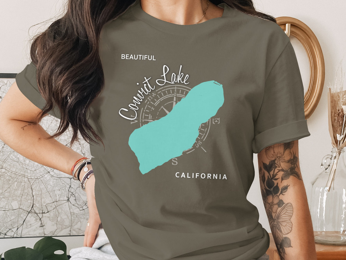 T-shirt with turquoise Cowit Lake map and compass pointing North.