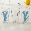 Three clear glasses with Rend Lake Illinois map and compass design.