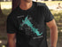 Black t-shirt with teal Hudson Lake Oklahoma outline and compass graphic.