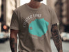 Taupe t-shirt with Crater Lake Oregon graphic and compass design.