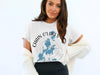 White t-shirt with "Chain O' Lakes Illinois" and a blue map of lakes.