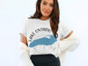 White t-shirt with Lake Ontario map and compass design, including text.