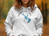 White hoodie with Whiskey Town Lake California graphic and compass rose.