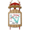 Wooden sled ornament with "Merry Christmas FROM Lake Fork" and snowflakes.