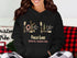Black hoodie with "Falls Lake North Carolina" and nautical graphics.