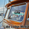 Channel Life logo on boat window and Lake Lodge Media text.