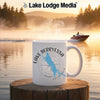 White mug with Lake Berryessa map and compass design on a misty lake background.
