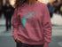Pink sweatshirt featuring a turquoise outline map of Hogan Lake, California.
