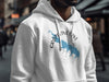 White hoodie with Grapevine Lake map graphic and compass rose.