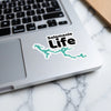 Salamonie Life sticker with a teal lake outline on a laptop.