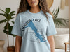 Light blue t-shirt with Hudson Lake Oklahoma map and compass graphic.