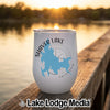 White stemless travel tumbler featuring a blue map of Shaver Lake and compass design sitting on a wooden dock.