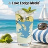 Glass of lemonade with Lake Casitas map on beach background and "Lake Lodge Media" logo.