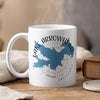 White mug with blue Lake Arrowhead California map and compass design.