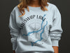 Light blue sweatshirt with Shuswap Lake map graphic and compass design.