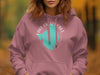 Rose pink hoodie with white text and teal graphic of Lake Okeechobee, Florida.