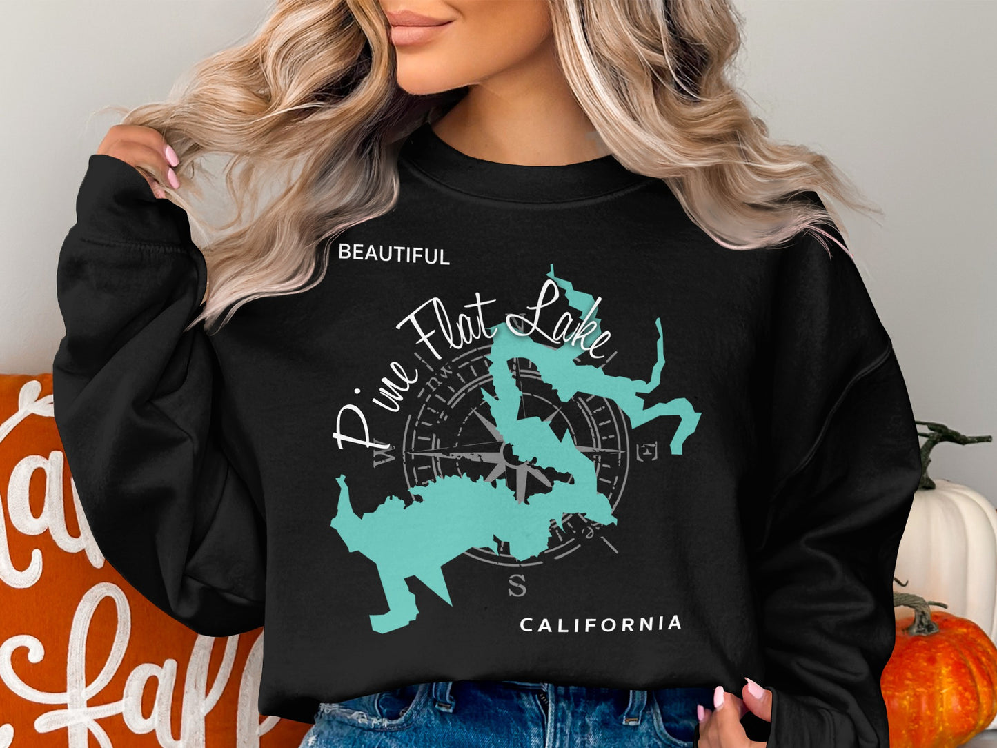 Black sweatshirt featuring a teal map of Pine Flat Lake with compass rose and text.