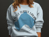 Light blue sweatshirt with Little Turtle Lake Minnesota graphic and compass rose.