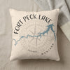 Pillow with Fort Peck Lake, Montana map and compass graphic.