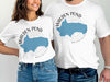White t-shirts with Walden Pond Massachusetts map and compass design.
