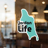 Teal shaped sticker with black text "Jordan Life" and copyright Lake Lodge Media LLC.