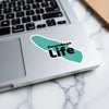 Onondaga Life sticker on a laptop keyboard.