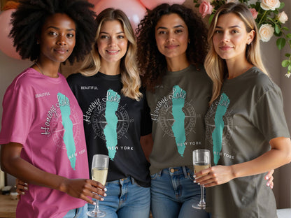 Four women wear t-shirts with "Honeoye Lake" and compass graphics.