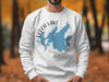 White sweatshirt with Leech Lake Minnesota map and compass graphic.