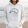 White hoodie with Lake Minnewanka and Banff compass graphic.
