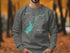 Gray sweatshirt featuring "Great Sacandaga Lake" compass design with New York state outline.