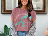 Pink t-shirt with turquoise map outline and compass graphic reading "Little Saint Germain Lake Wisconsin".