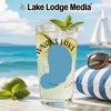 Glass with drink, limes, mint, and "Wnans Lake Florida" graphic on beach.