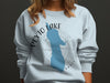 Light blue sweatshirt with Peyto Lake graphic and compass design.